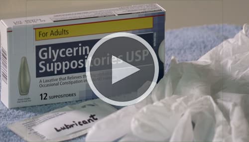 Box of glycerin suppositories, lubricant and latex gloves