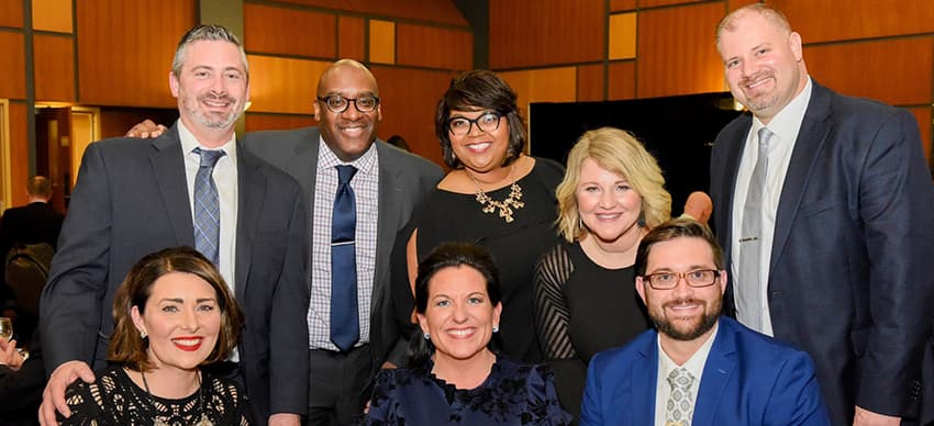 Group of people formally dressed at the evening of wishes event