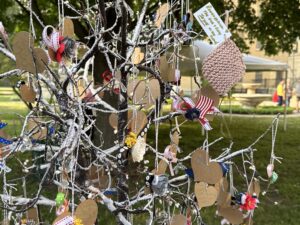 Our community memorial tree filled with messages to loved ones lost after our 2023 Service of Remembrance.